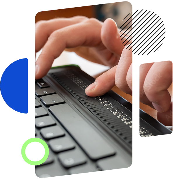 Close-up of hands using a black Braille keyboard.